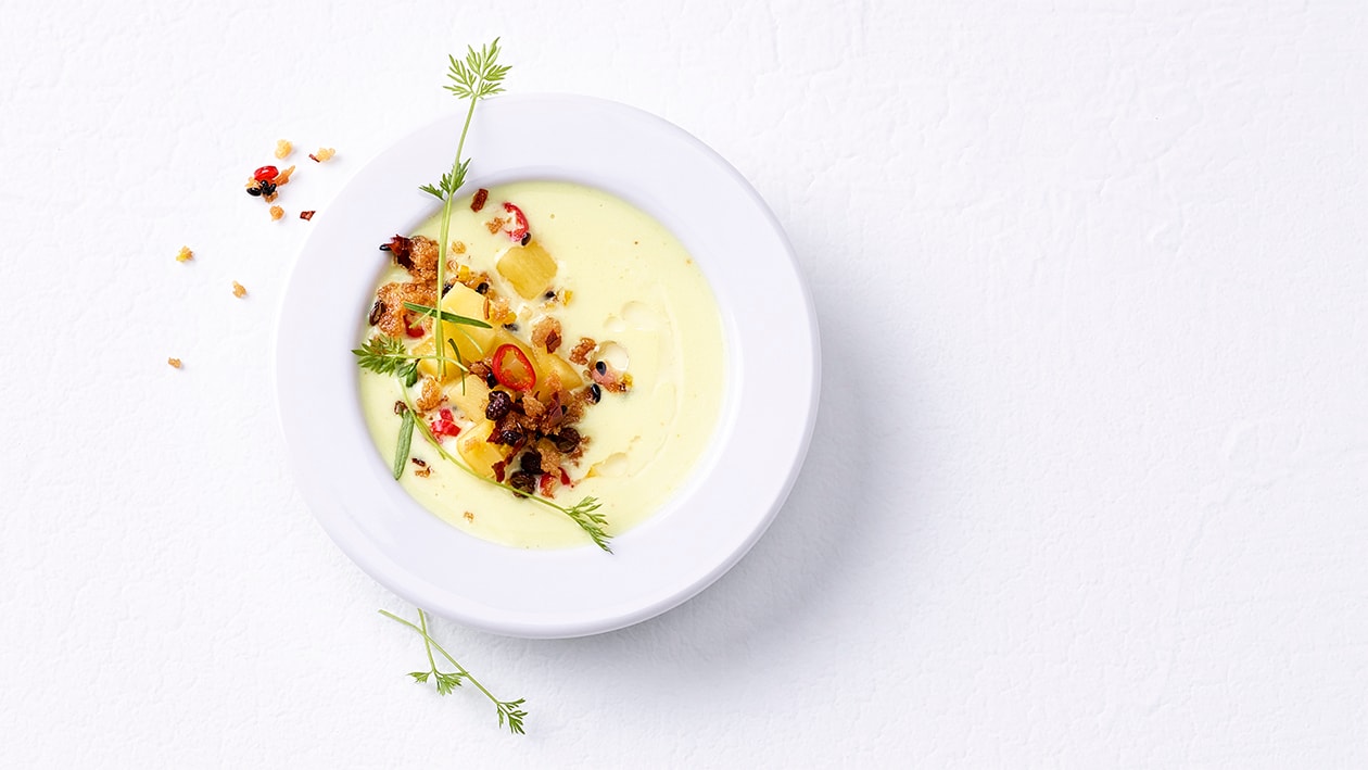 Crème d'asperges au curcuma, mangue et huile orangée –  